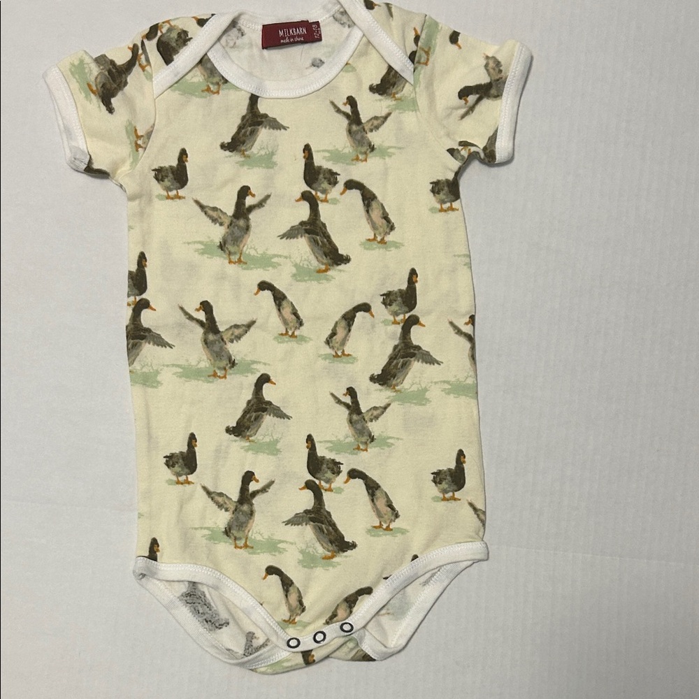 Milkbarn Cream Bodysuit with Duck Pattern
NWOT  12-18 month